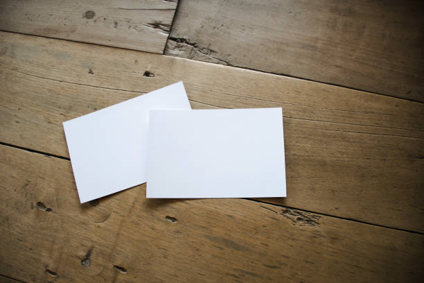istock top view of white postcard or papers on old wooden background 1090529366