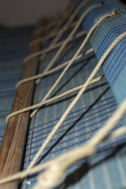 istock Loom parts and threads closeup 1090532804
