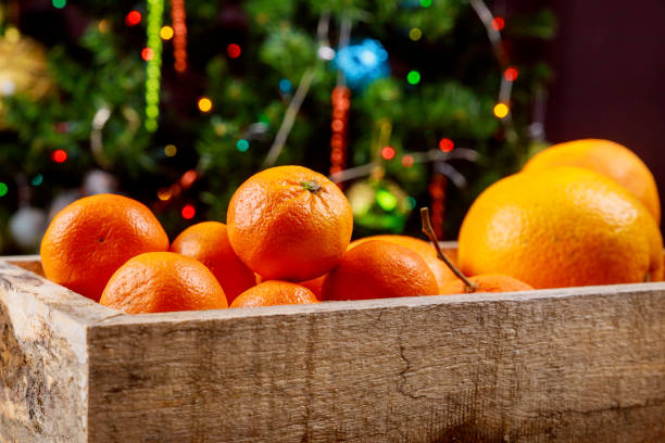 istock Tangerines as Fir-tree Toy and Branch with boke 1090539528