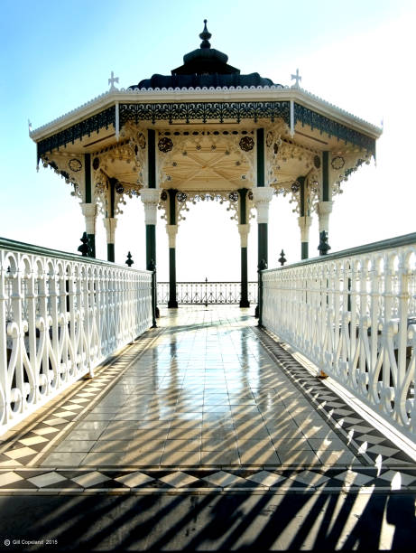 ornate tiled pathway leading the octagon shaped Brighton bandstand