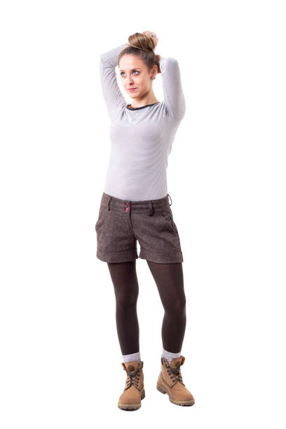 istock Cute beautiful authentic style woman making hair bun looking up 1090544960