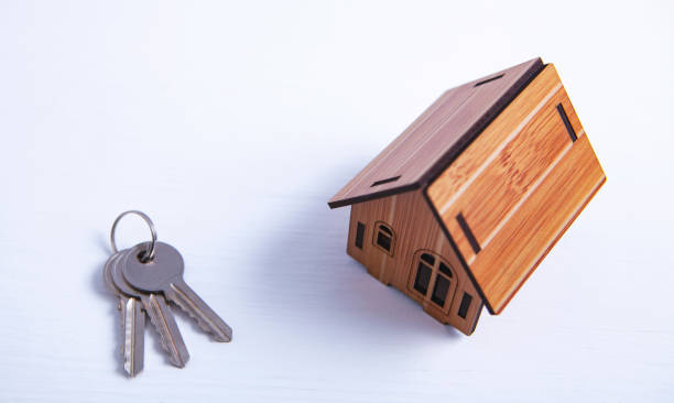 istock house keys on a wooden background 1090546346