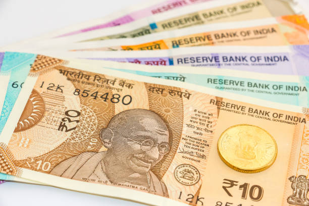 istock New indian 10, 50, 100, 200, 500 and 2000 rupees banknotes and coin. 1090548858