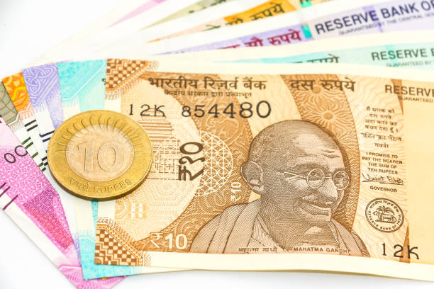 istock New indian 10, 50, 100, 200, 500 and 2000 rupees banknotes and coin. 1090548880