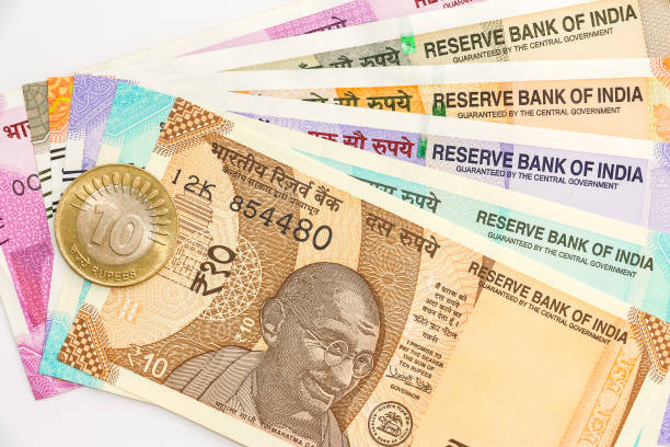 istock New indian 10, 50, 100, 200, 500 and 2000 rupees banknotes and coin. 1090548896