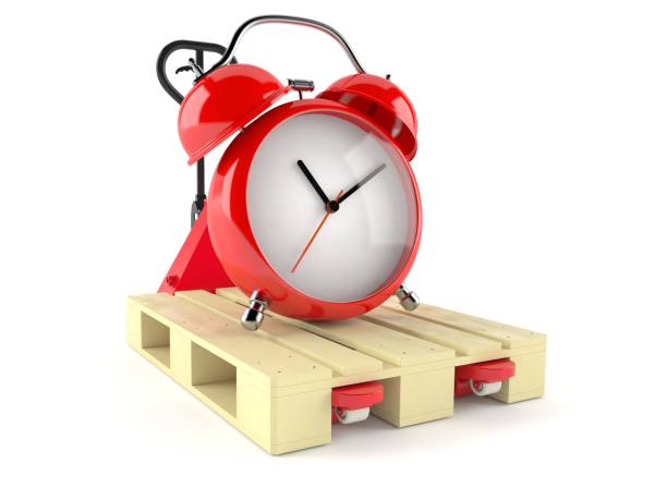 istock Alarm clock on hand pallet truck 1090550498
