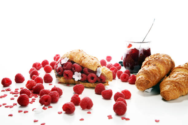 istock Delicious breakfast with fresh croissants and ripe berries 1090551726