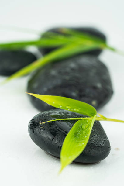 istock massage equipment and black stones 1090554046