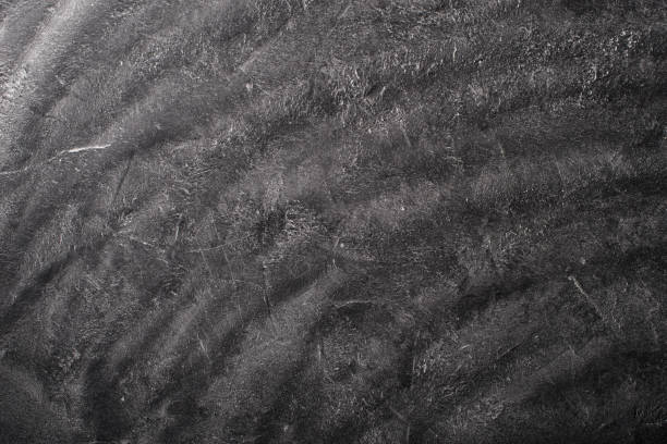 istock Black and gray textured stone or rock background 1090554618