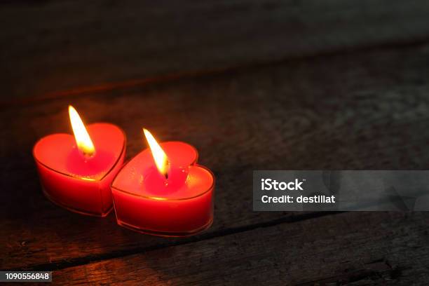 Heart Shaped Candles Burning Stock Photo - Download Image Now - Candle,  Heart Shape, Bright - iStock