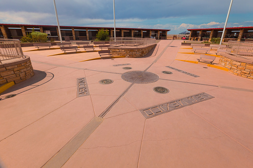 Four Corners Monument, Border of the State of Utah, Colorado, New Mexico, and Arizona, USA - July 26 2018: The Intersection of four states in the southwest of USA. The Four Corners Monument Marking the exact location of the intersection.
