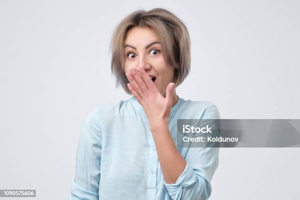 Lovely Young Woman With Shy Gesture Looking At You Stock Photo - Download Image Now - Adult, Appearance, Beautiful People