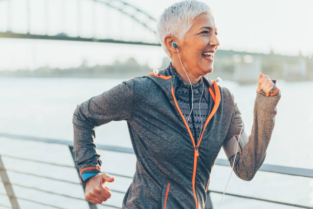 istock Athletic senior woman running 1090581880