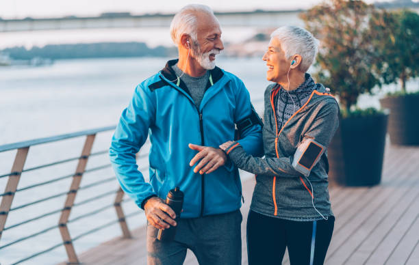 istock Joyful senior couple jogging 1090581882