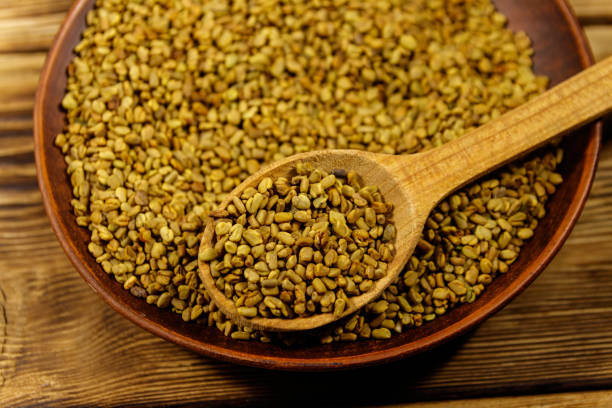 istock Fenugreek seeds in ceramic plate on wooden table 1090581898