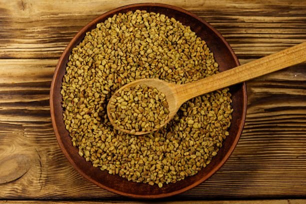 istock Fenugreek seeds in ceramic plate on wooden table 1090581904