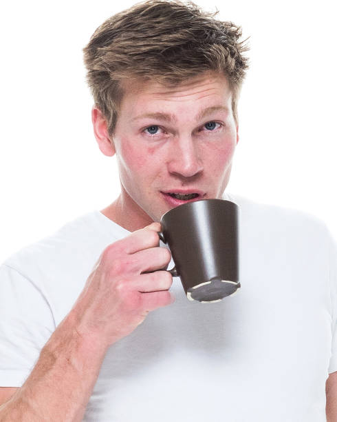 istock Attractive young male in underwear is drinking coffee 1090589500
