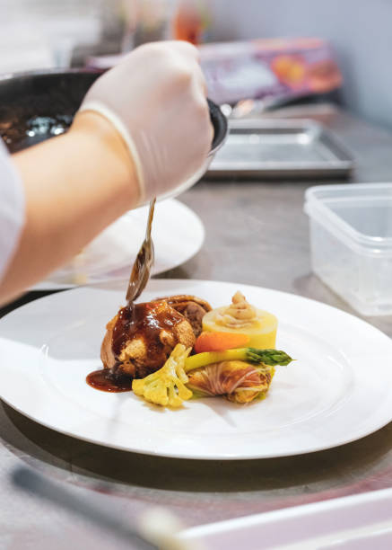 istock Chef cooking food in the kitchen, Chef preparing food 1090589766