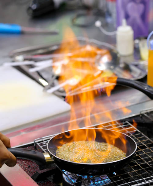 istock Chef cooking food in the kitchen, Chef preparing food 1090589824