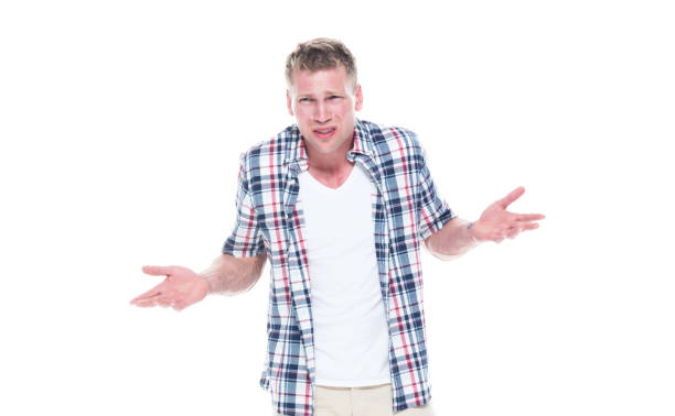 istock Handsome man in shirt and shorts is feeling confused 1090590674
