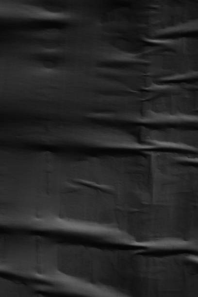 istock Dark black blank paper backgrounds creased crumpled surface old torn ripped posters grunge textures placard 1090593334