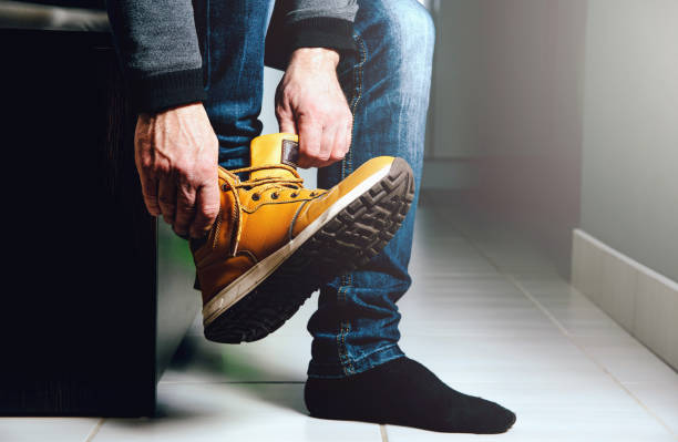 istock Putting shoes in the hall, preparing for the exit. 1090598278