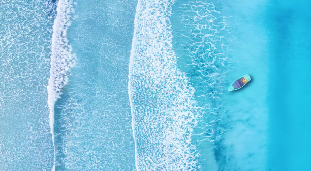 istock Beach and waves from top view. Turquoise water background from top view. Summer seascape from air. Top view from drone. Travel concept and idea 1090598332