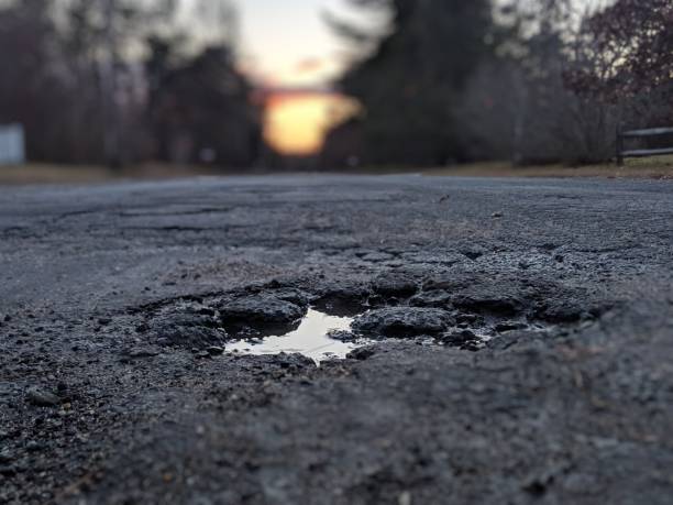 istock Pothole up close on the street 1090606322