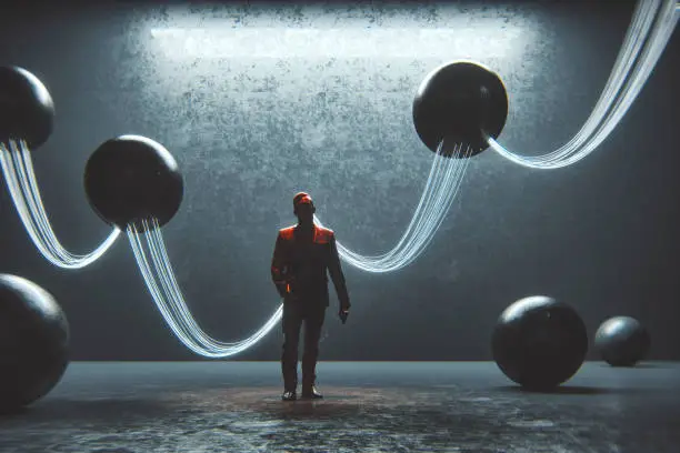 Photo of Abstract businessman with wired spheres