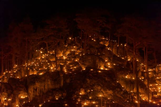 istock Small fires in a rocky hill with trees during a light celebration in the Frankonian Alb, Southern Germany. 1090634284
