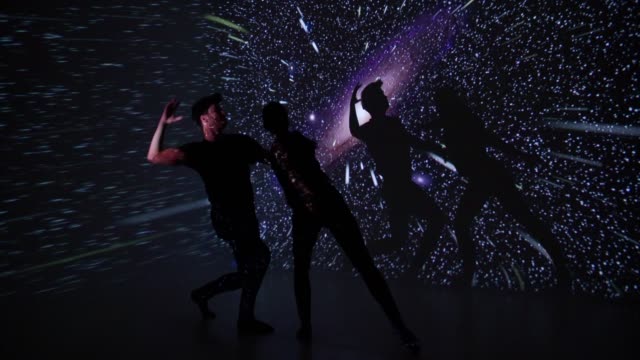 Space projection upon dancer couple