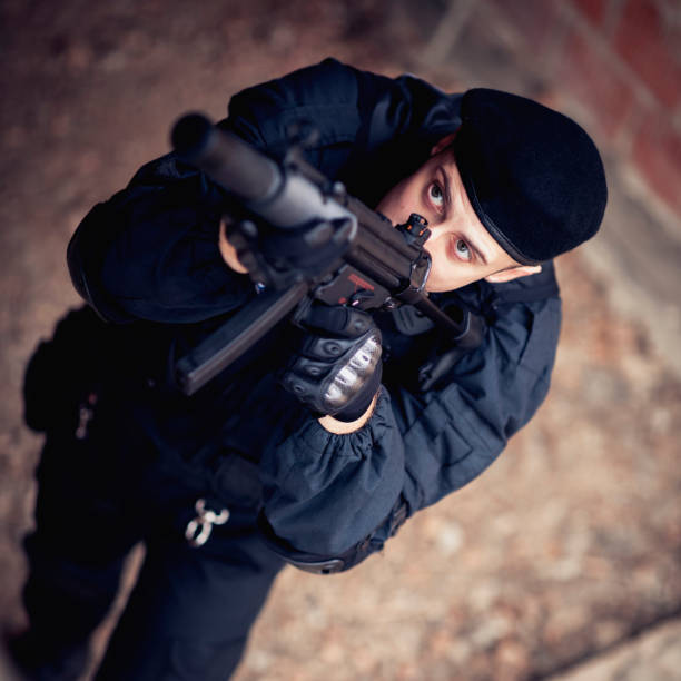 istock Swat Police Officer Shooting With Firearm 1090637882