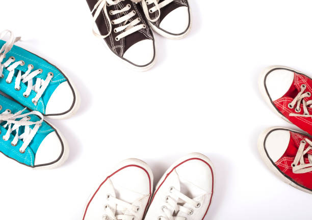 istock arm raised and holding shoes 1090643184
