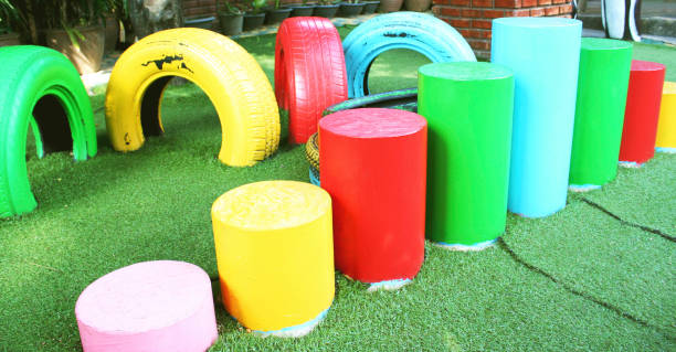 istock Colorful tire chairs and cylinder chairs at Playground 1090645166
