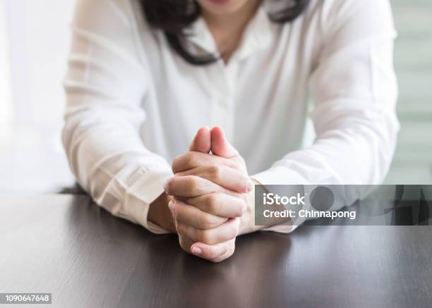 Woman Prayers Hands Holding Together Praying In For Religious Holy Spirit Forgiveness Mourning In Silence Concept Stock Photo - Download Image Now