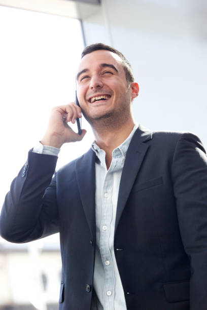 istock happy businessman talking on cellphone 1090648532