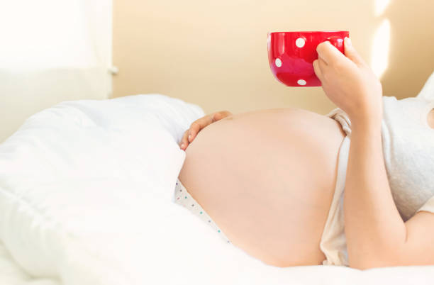 istock Pregnant young woman relaxing 1090652162