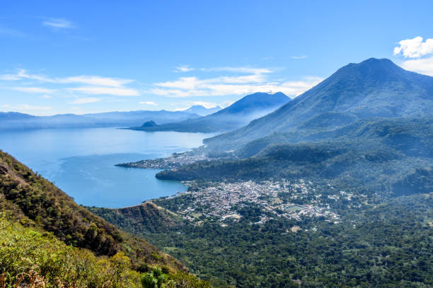 Looking down on Lake Atitlan & 5 volcanoes, Guatemala Looking down on Lake Atitlan, 5 volcanoes, San Juan La Laguna & San Pedro la Laguna in Guatemalan highlands. guatemala landscape stock pictures, royalty-free photos & images