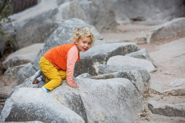istock boy visit Sequoia national park in California, USA 1090656876