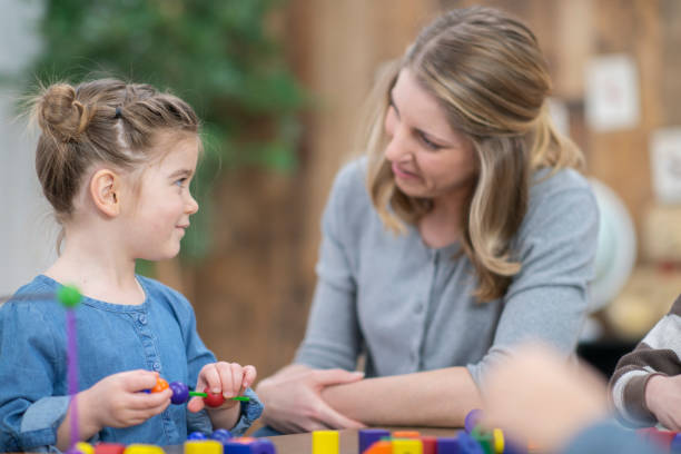 istock Babysitter And Girl 1090660652