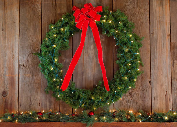 istock Christmas Wreath with Red Ribbon 1090676584