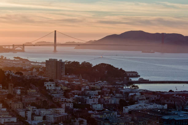 istock Distant view of Golden gate bridge under sunset. 1090683544