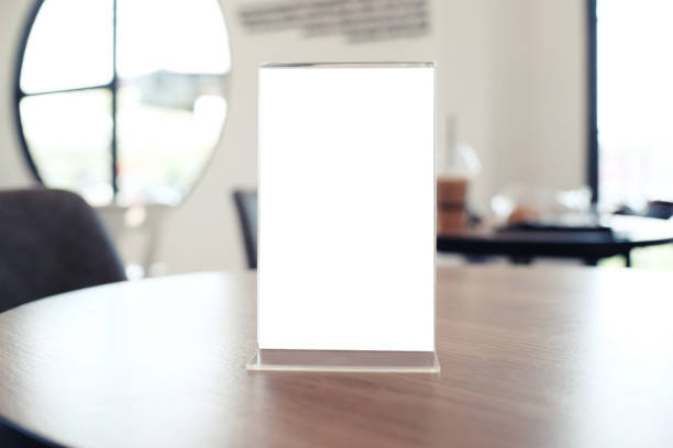 istock Menu frame standing on wood table in Bar restaurant cafe. space for text marketing promotion. 1090726880