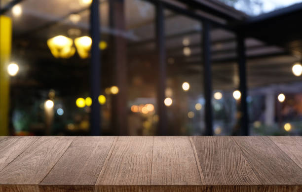 istock Empty dark wooden table in front of abstract blurred bokeh background of restaurant . can be used for display or montage your products.Mock up for space. 1090727012