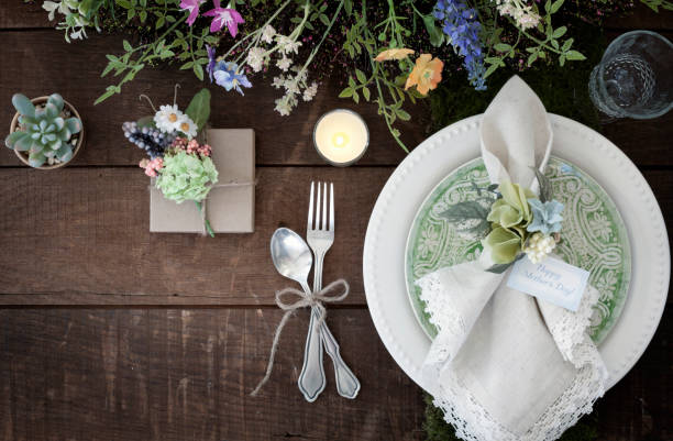 istock Mother's Day Dining Rustic Place Setting on Old Wood Background 1090730552