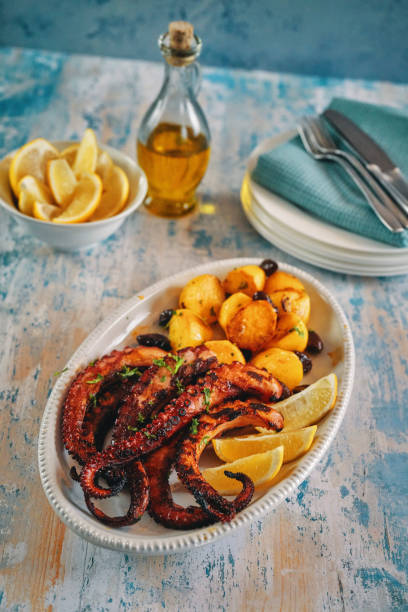 istock Octopus Tentacles with Potatoes and Fresh Lemon 1090731984