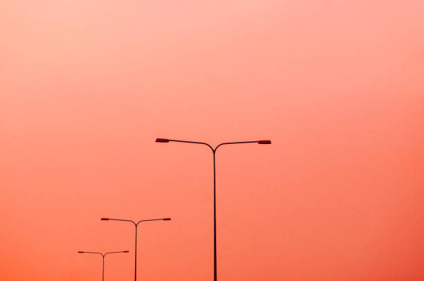 istock Street light against sunset sky 1090732514