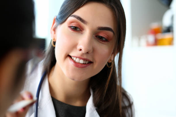 istock Beautiful smiling female doctor talk with patient 1090733814