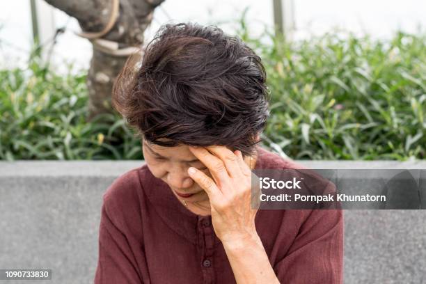 Brain Diseases Problem Cause Chronic Severe Headache Migraine Asia Female Adult Look Tired And Stressed Out Depressed Having Mental Problem Trouble Medical Concept Stock Photo - Download Image Now