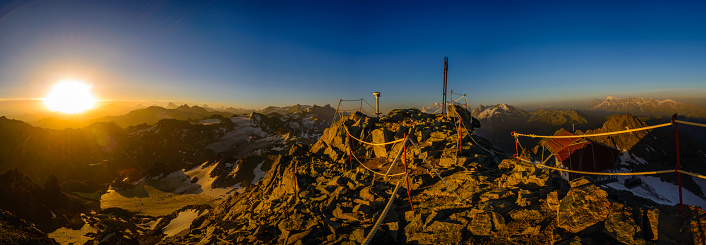 Sunrise from the summit of Mont Fort, near Verbier in the Swiss alps. The view takes in the peaks of Matterhorn, Dent blanche, Weisshorn, Grand Combin and Gran Paradiso.